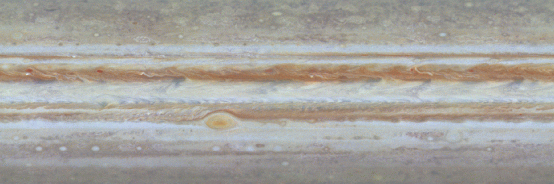 The first color movie of Jupiter from NASA's Cassini spacecraft shows what it would look like to peel the entire globe of Jupiter, stretch it out on a wall into the form of a rectangular map, and watch its atmosphere evolve with time. Credit: NASA/JPL/University of Arizona