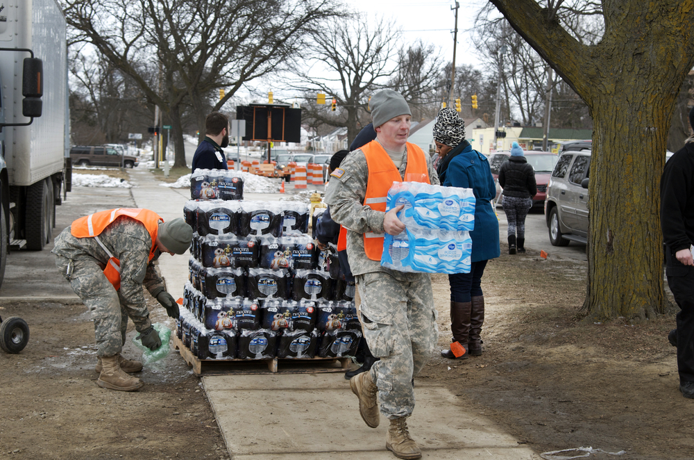 Bottled water distribution by the National Guard in Flint, Michigan. Credit: Shutterstock