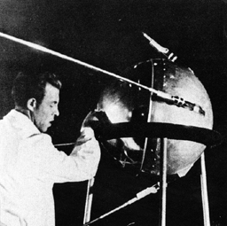 black and white image of sputnik and technician