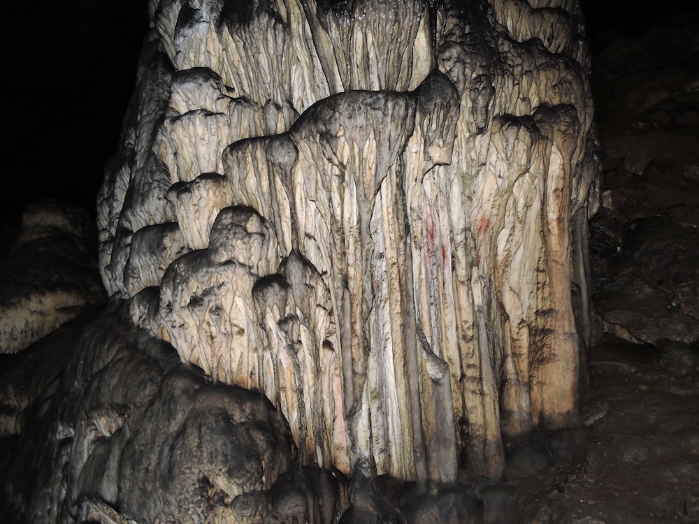 cave formation with some red pigment on it