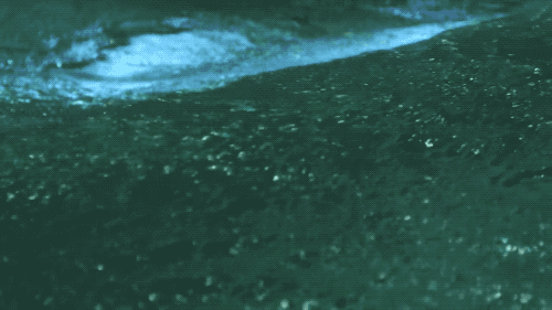 slow motion surface of a gentle wave rolling