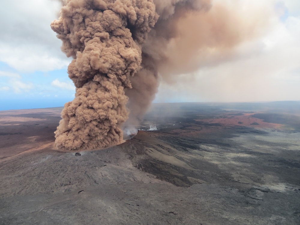 thick smoke emerging from mountain