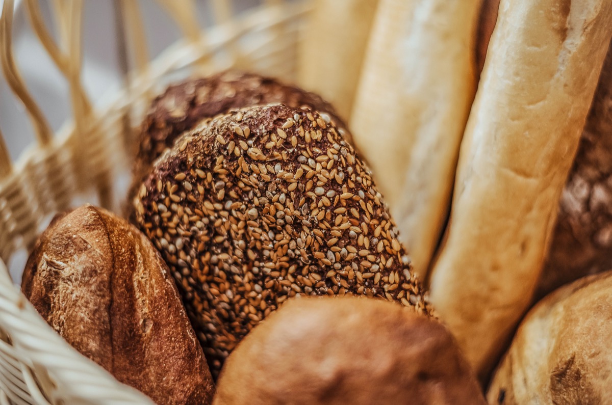 a basket of different kinds of breads