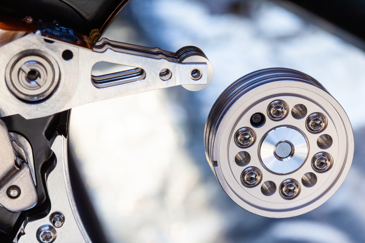 a close up image of the mechanism that reads a hard disk drive