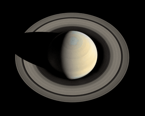 a gif overhead shot of saturn, half of its rings disappear over time