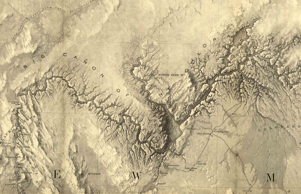 a close up detailed look of an engraved looking map that is a tan color. there is the snaking colorado river with the words "big canon of the colorado" written to indicate the grand canyon