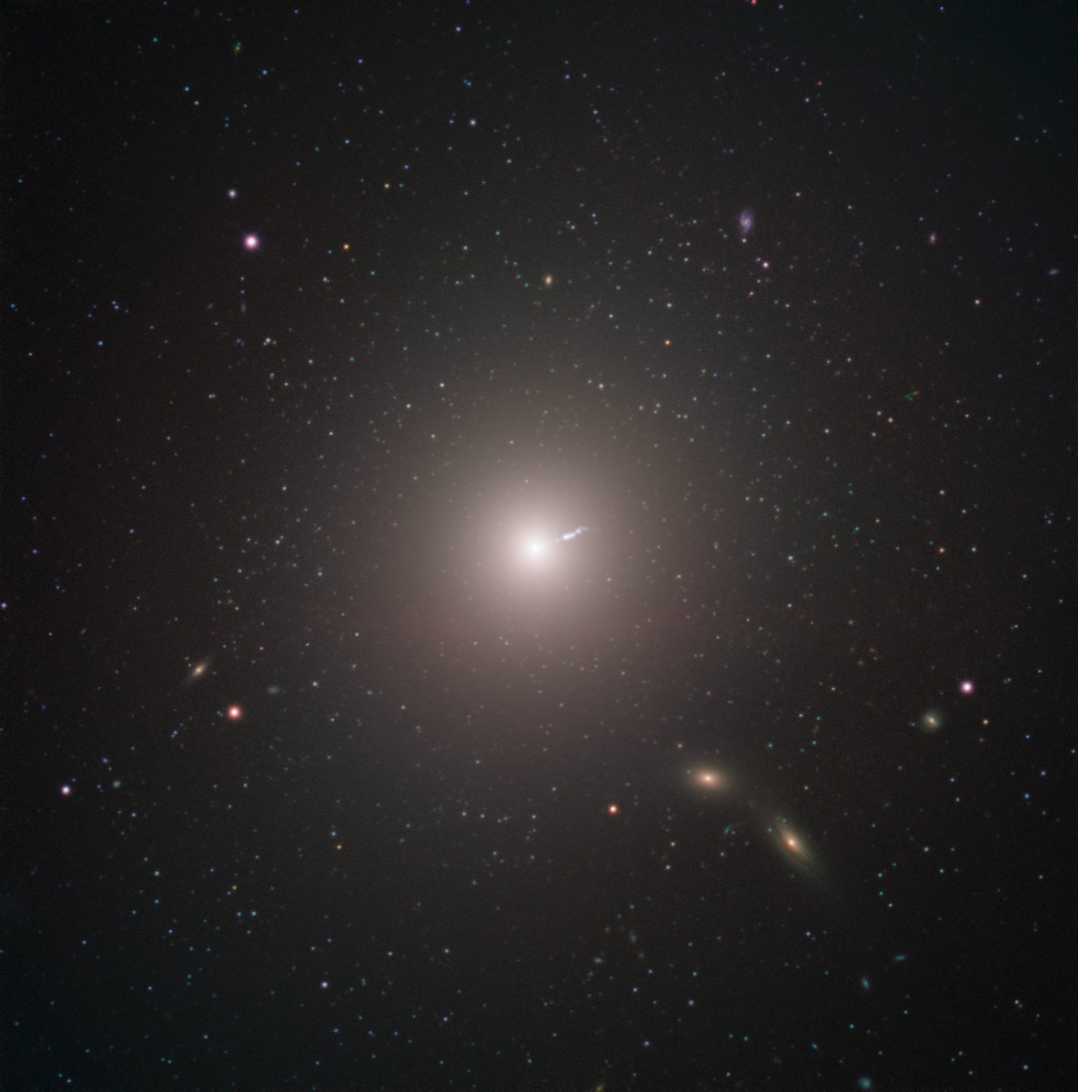 a bright pinpoint in the middle of a starfield. the bright pinpoint is the messier galaxy