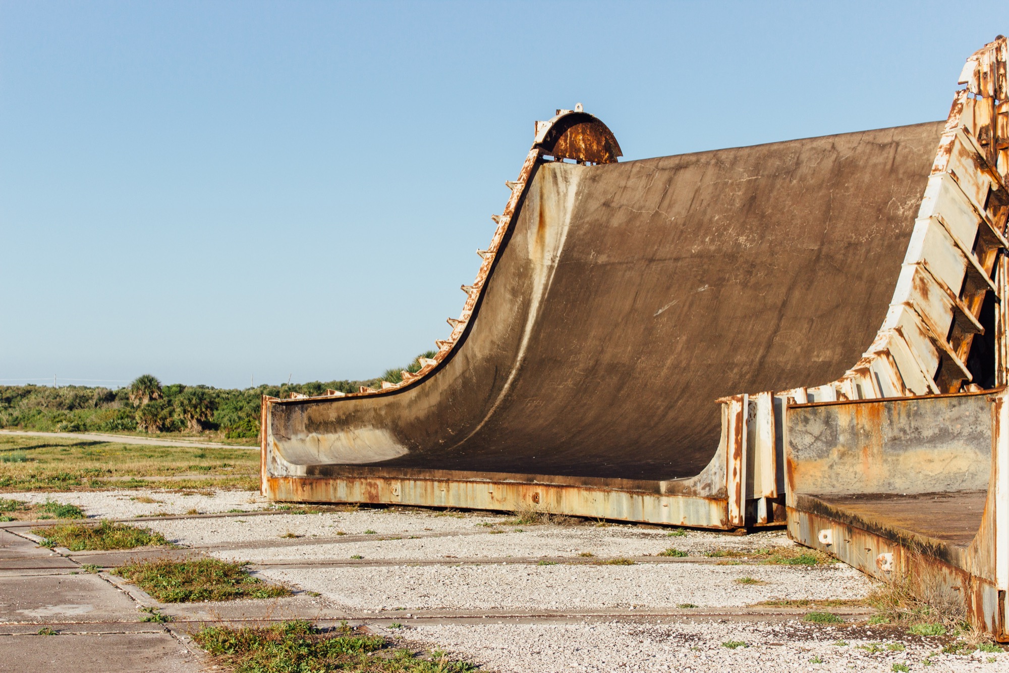 a rusting large concrete ramp structure