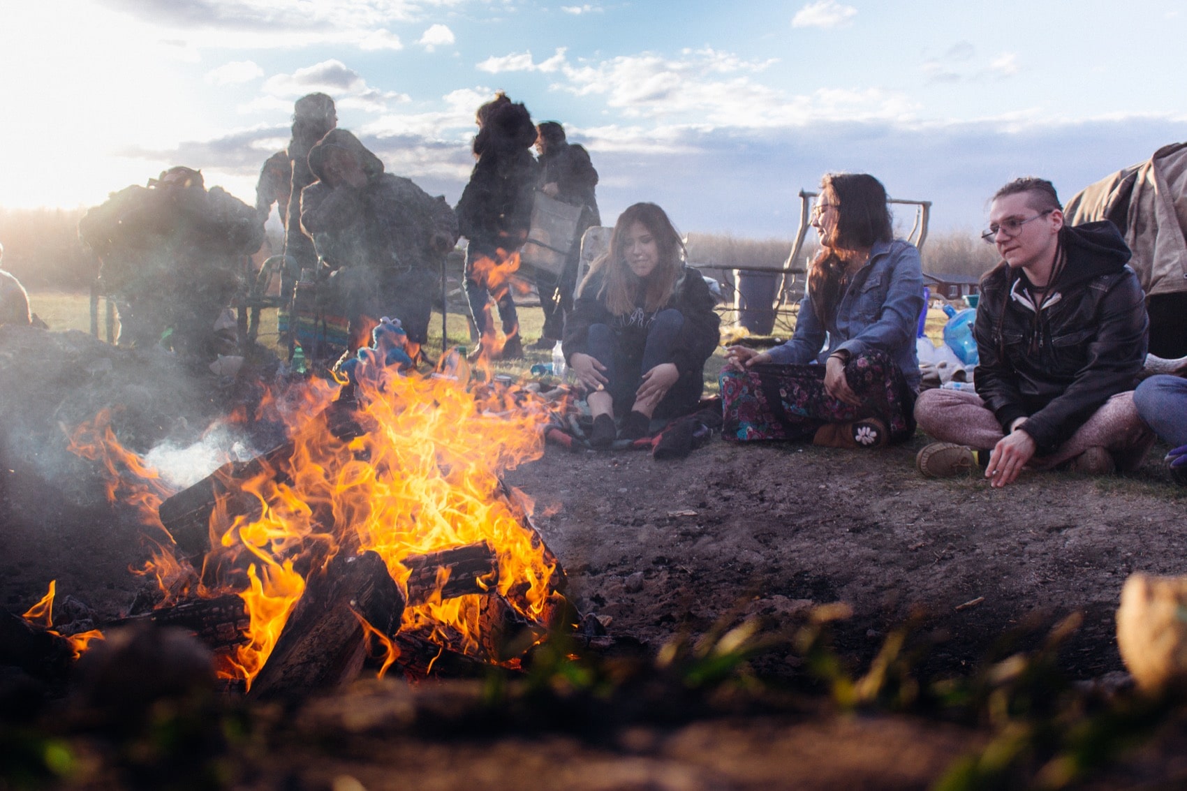 people around a campfire