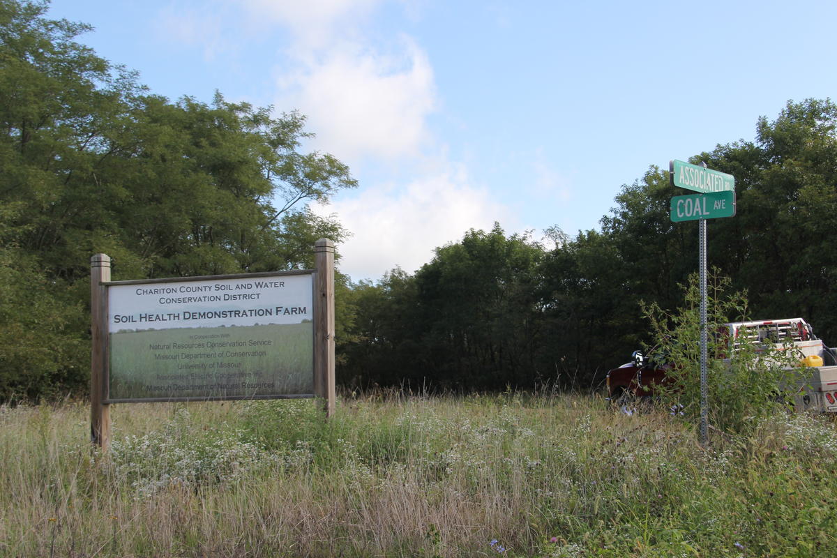 A sign in a field 