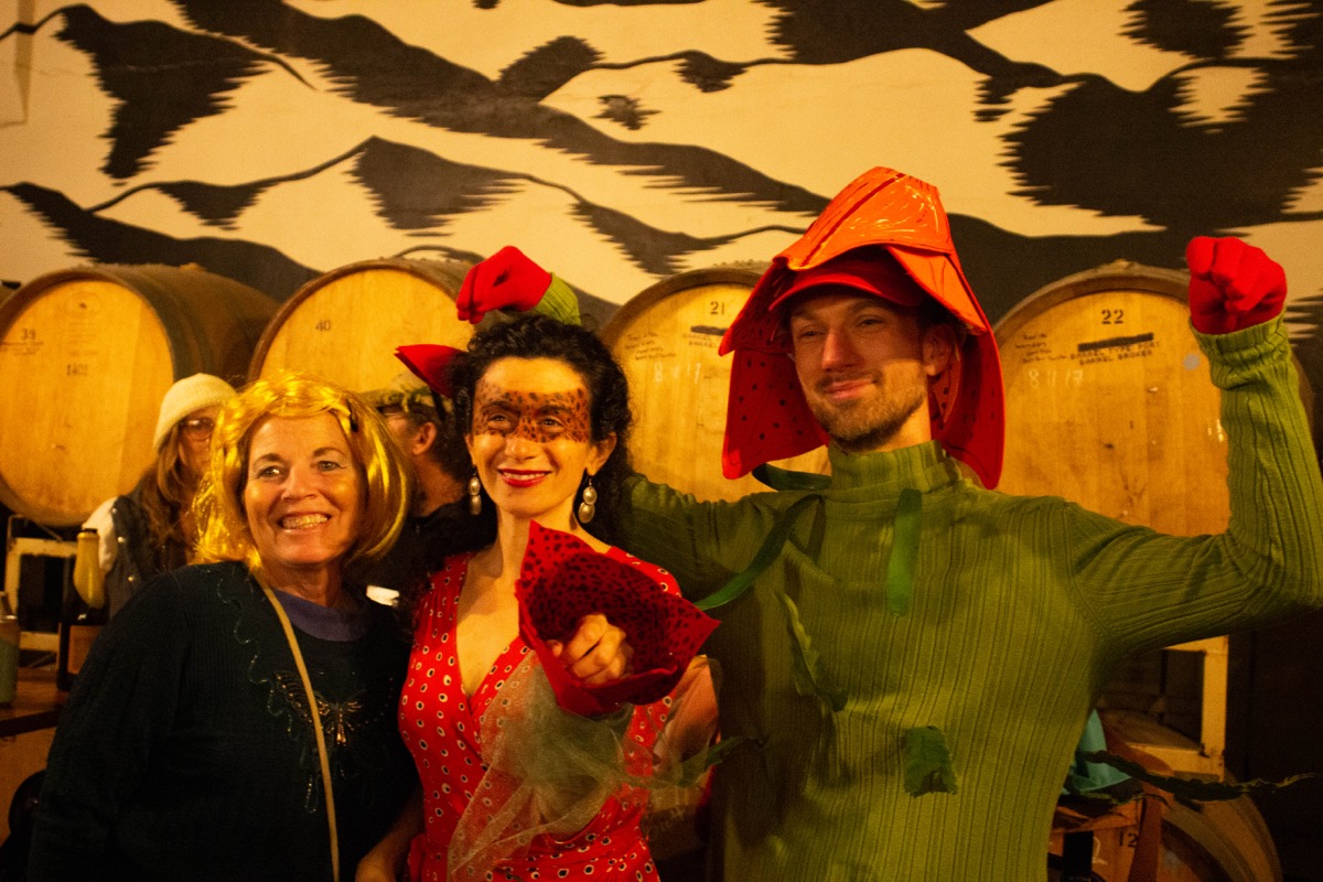 three people dressed up in costume as endemic species in north carolina. on the right is ben nelson as a grays lily