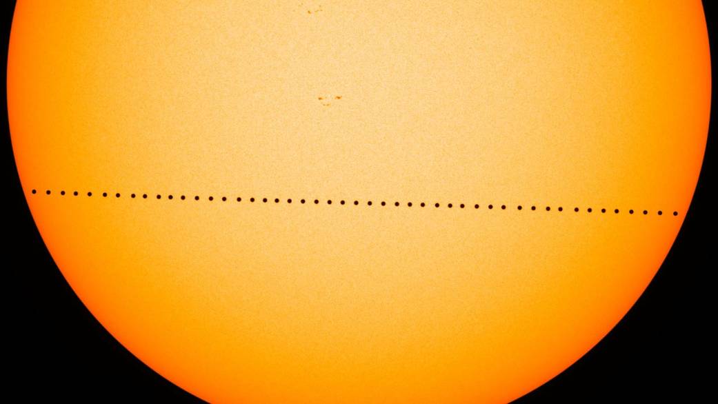 a time lapse image showing the transit of mercury across the sun