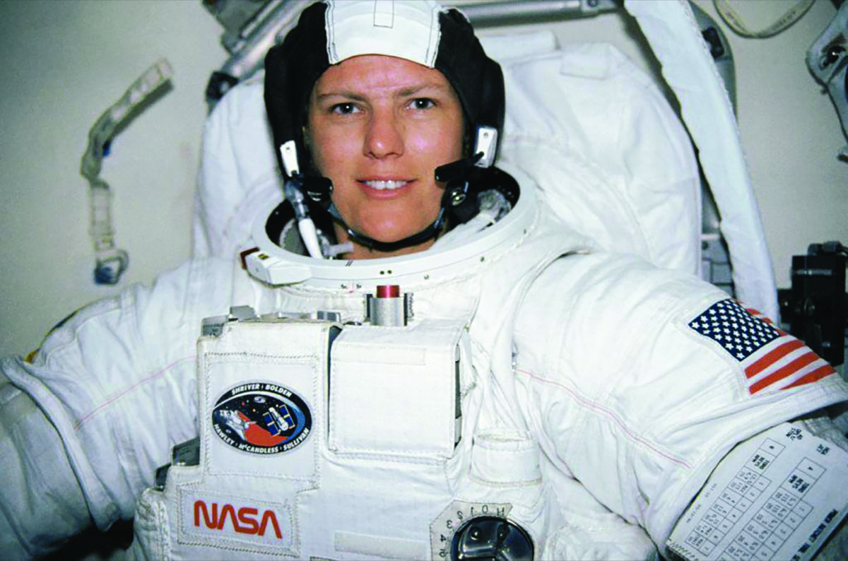 a woman in an astronaut suit