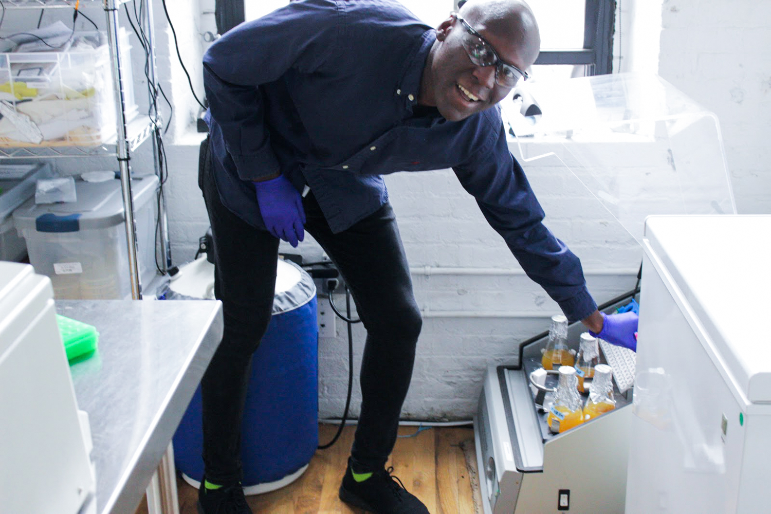 Man using laboratory equipment. 