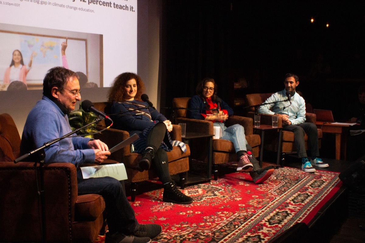 four people on stage in an interview