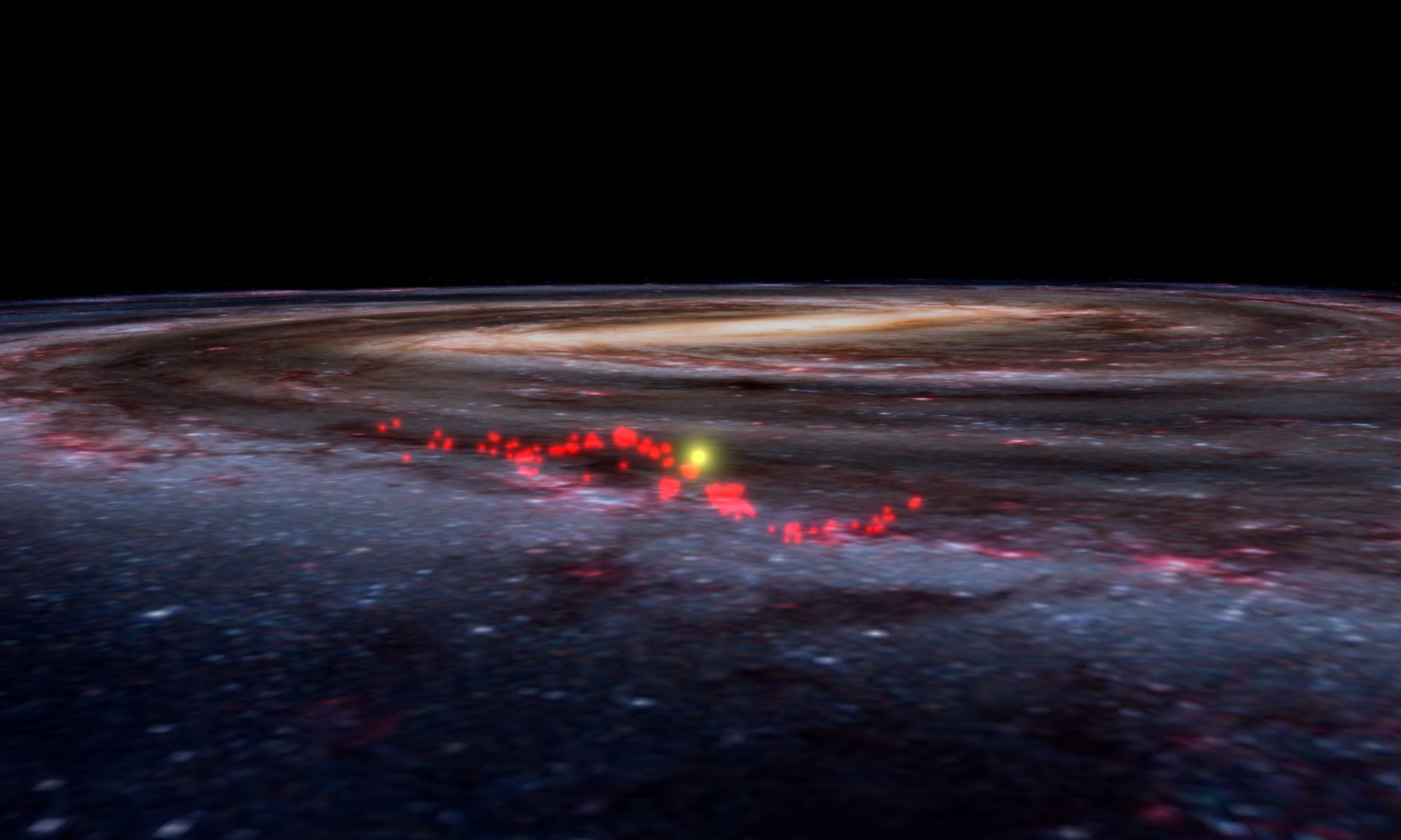 an image of the milky way with bits of red highlighted on one of the arms