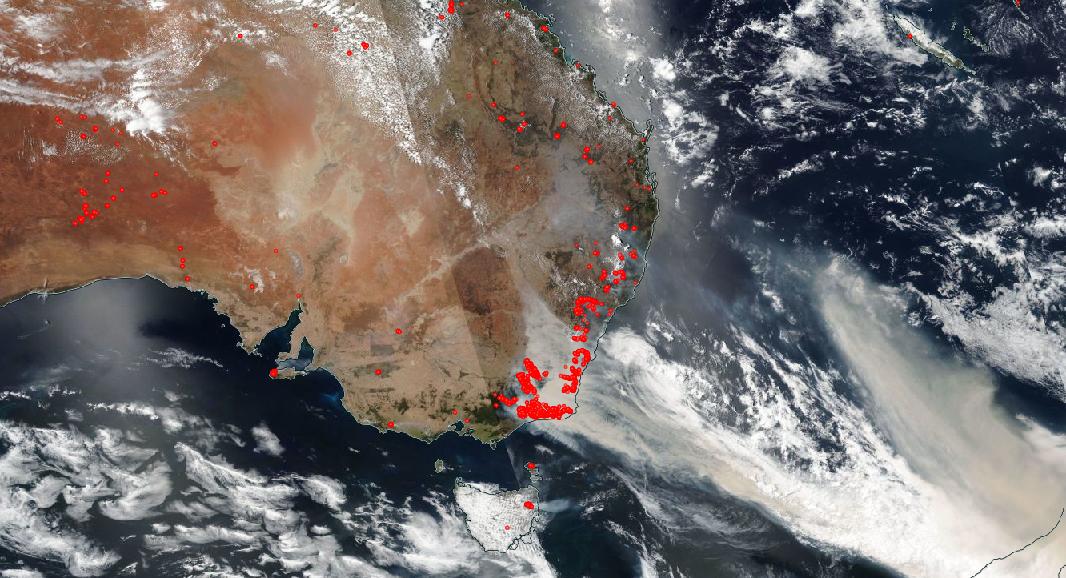 a satellite image taken over australia shows the smoke from the fires