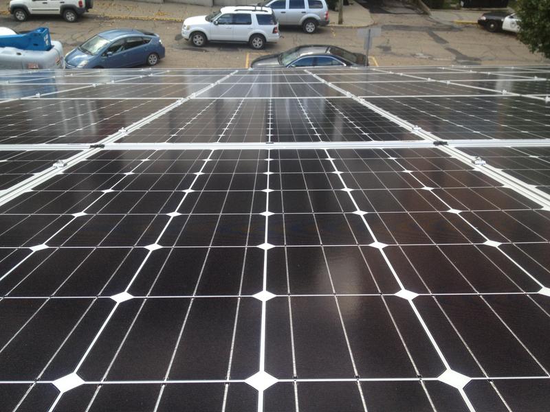 looking down at slanted solar panels. 