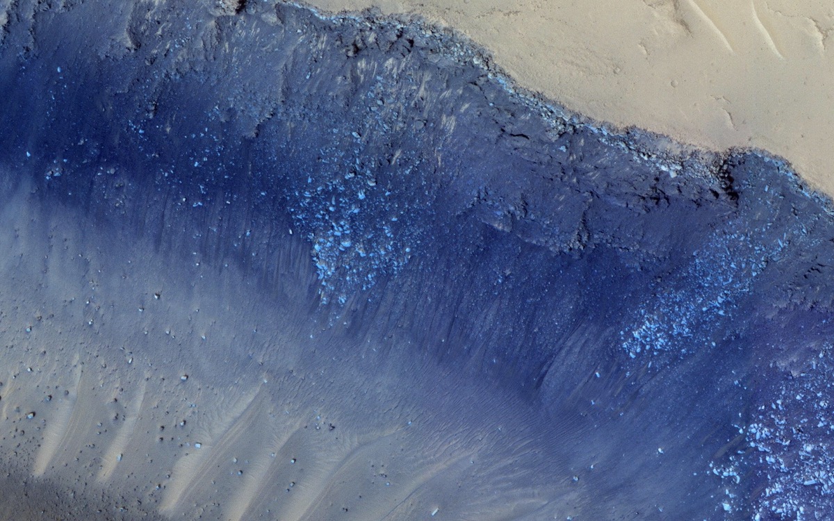 a satellite image of bluish looking earth on mars
