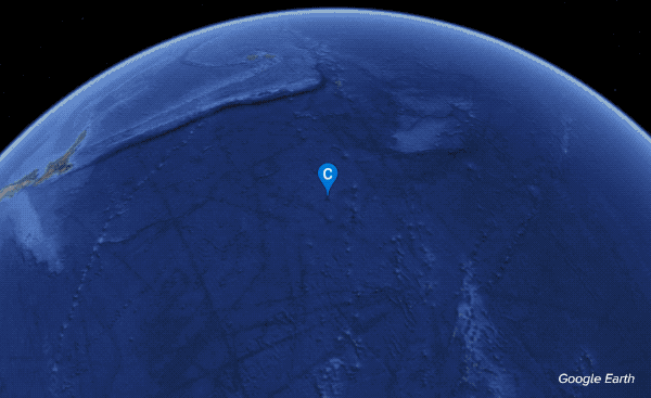 a gif of google earth zooming in into the ocean on a whale