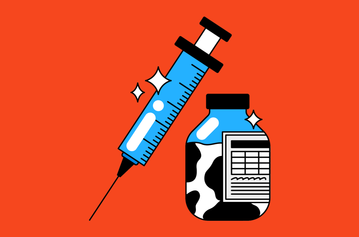 bottle filled with cow colored liquid and syringe on red background