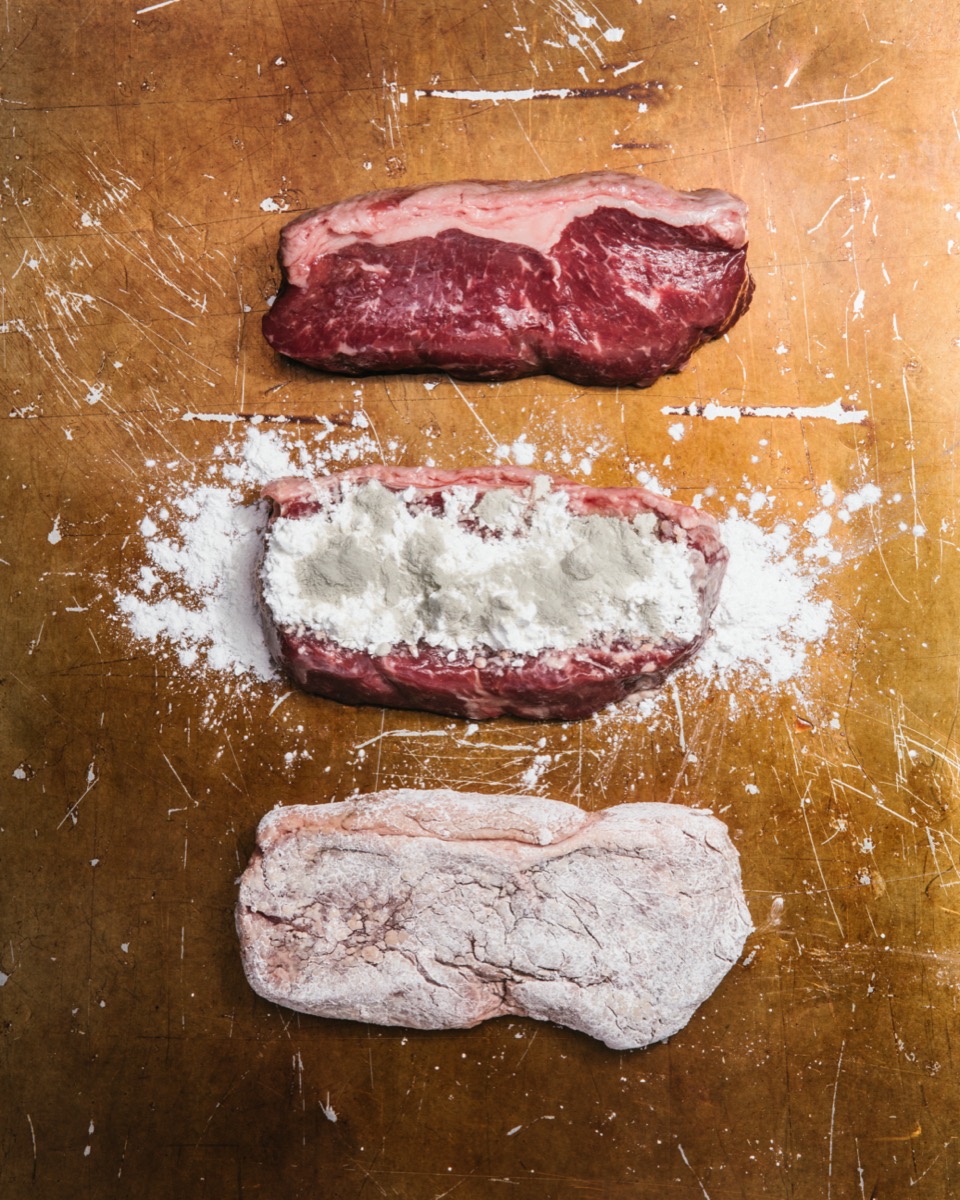 three slices of meat. one is raw and plain, the second is raw and dusting with white powder and brown mold, the third is raw but the seasoning is rubbed in