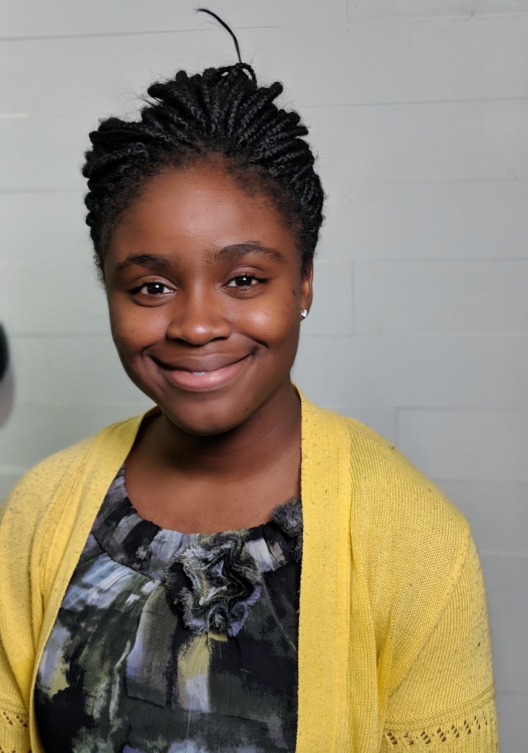 a woman smiling at the camera