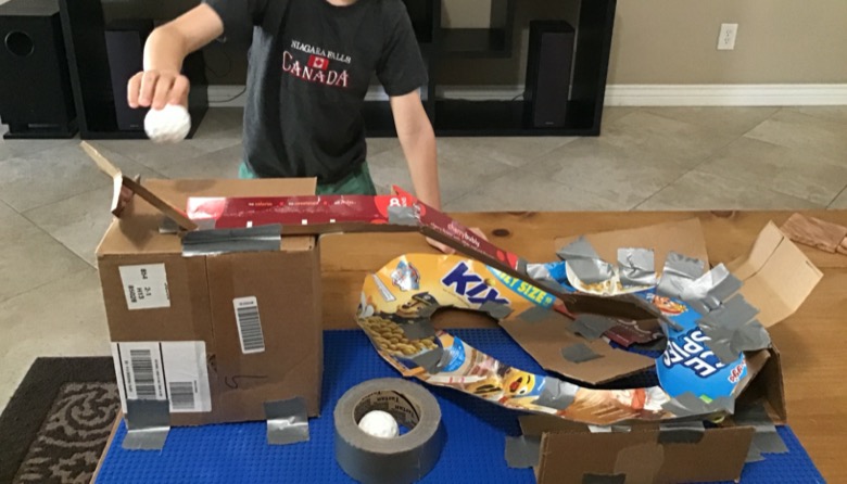 Cardboard roller coaster made out of cereal boxes