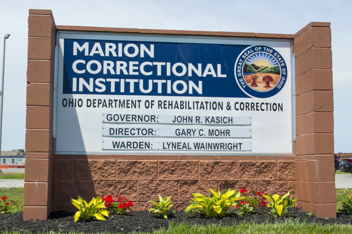 a sign that reads marion correctional institution, ohio department of rehabilitation and corrections