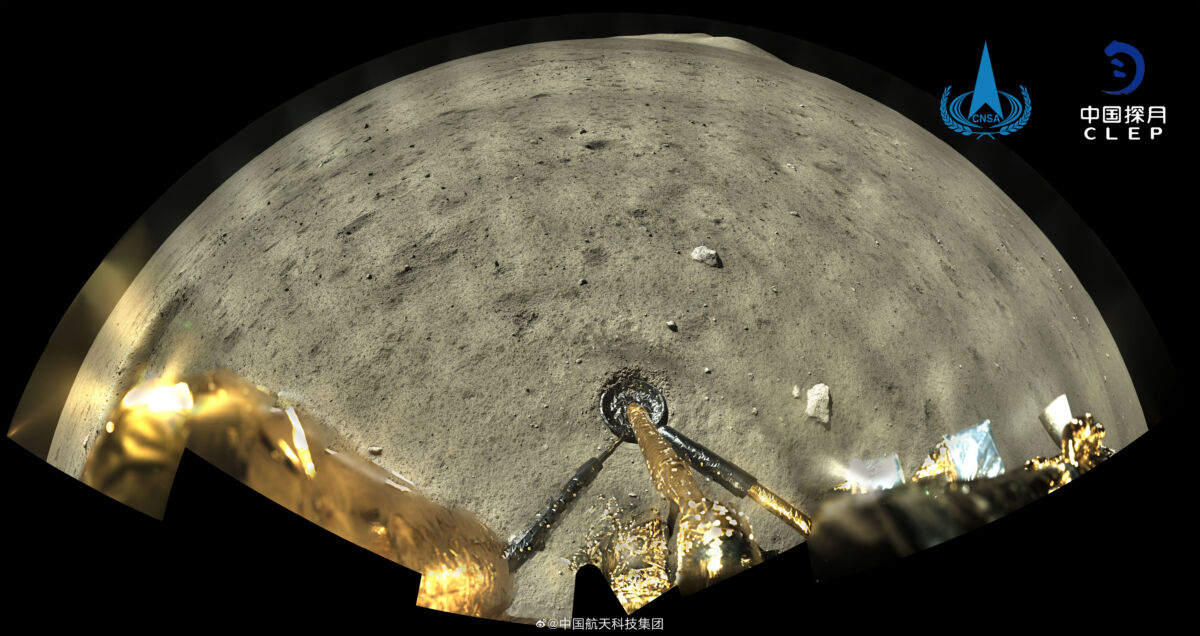 a panoramic image from the chinese lander looking at the surface of the moon and it's landing leg