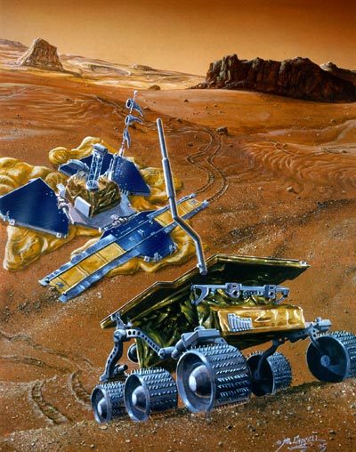 A colorized illustration of a six-wheeled robotic rover in the forefront, rolling over desert dunes. In the background is a three-pedaled lander with solar panels and various antennas. You can also see desert plateaus and cliffs.