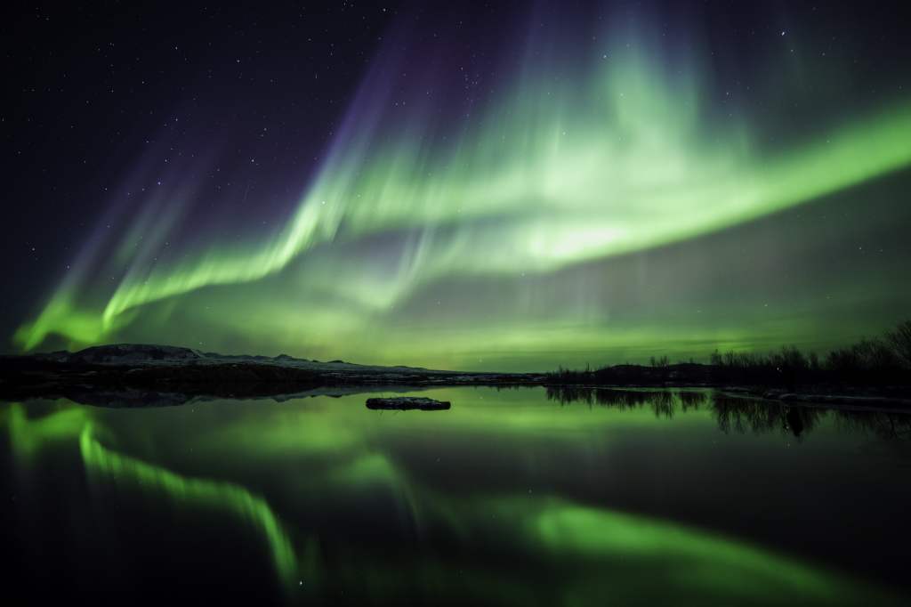 Northern lights over a lake