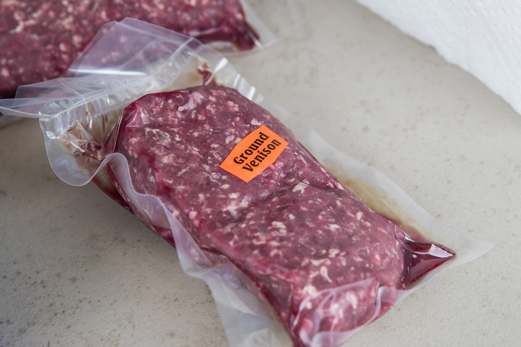 A package of raw ground venison.