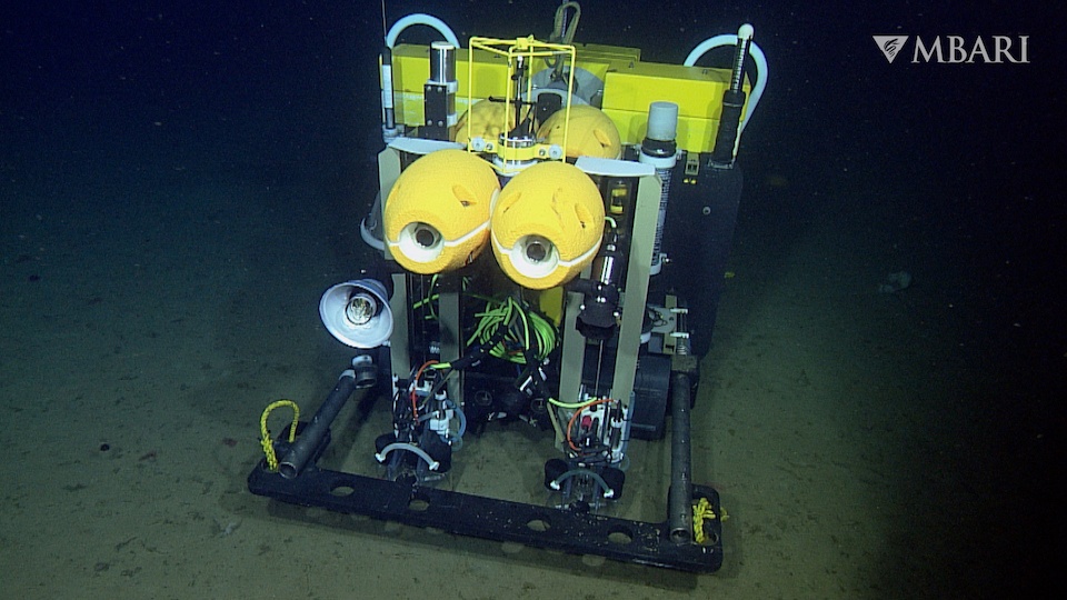 A collection of machinery parts and wheels that sits on the bottom of the ocean. 