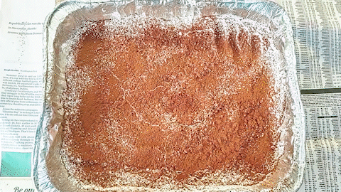 Rocks and other items crash into a pan of flour to make craters.