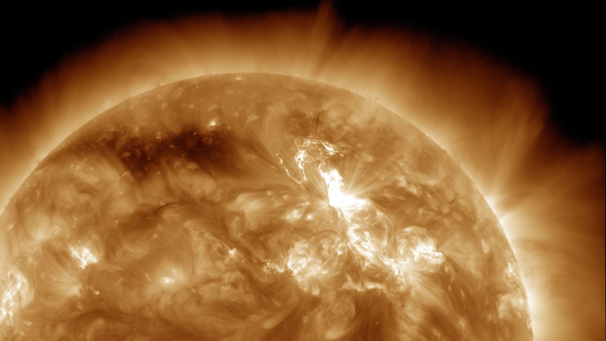 An image of the Sun with aa solar flare and CME.