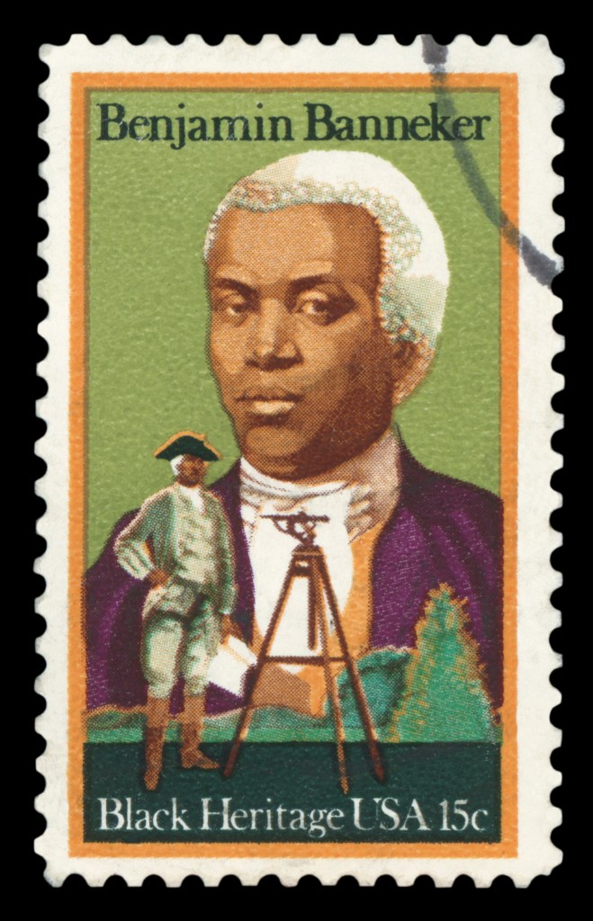 A stamp that reads "Benjamin Banneker, Black Heritage USA 15 cents." In the middle is an illustrated bust portrait of Benjamin Banneker and in the foreground a full body portrait of banneker with a surveying tool.