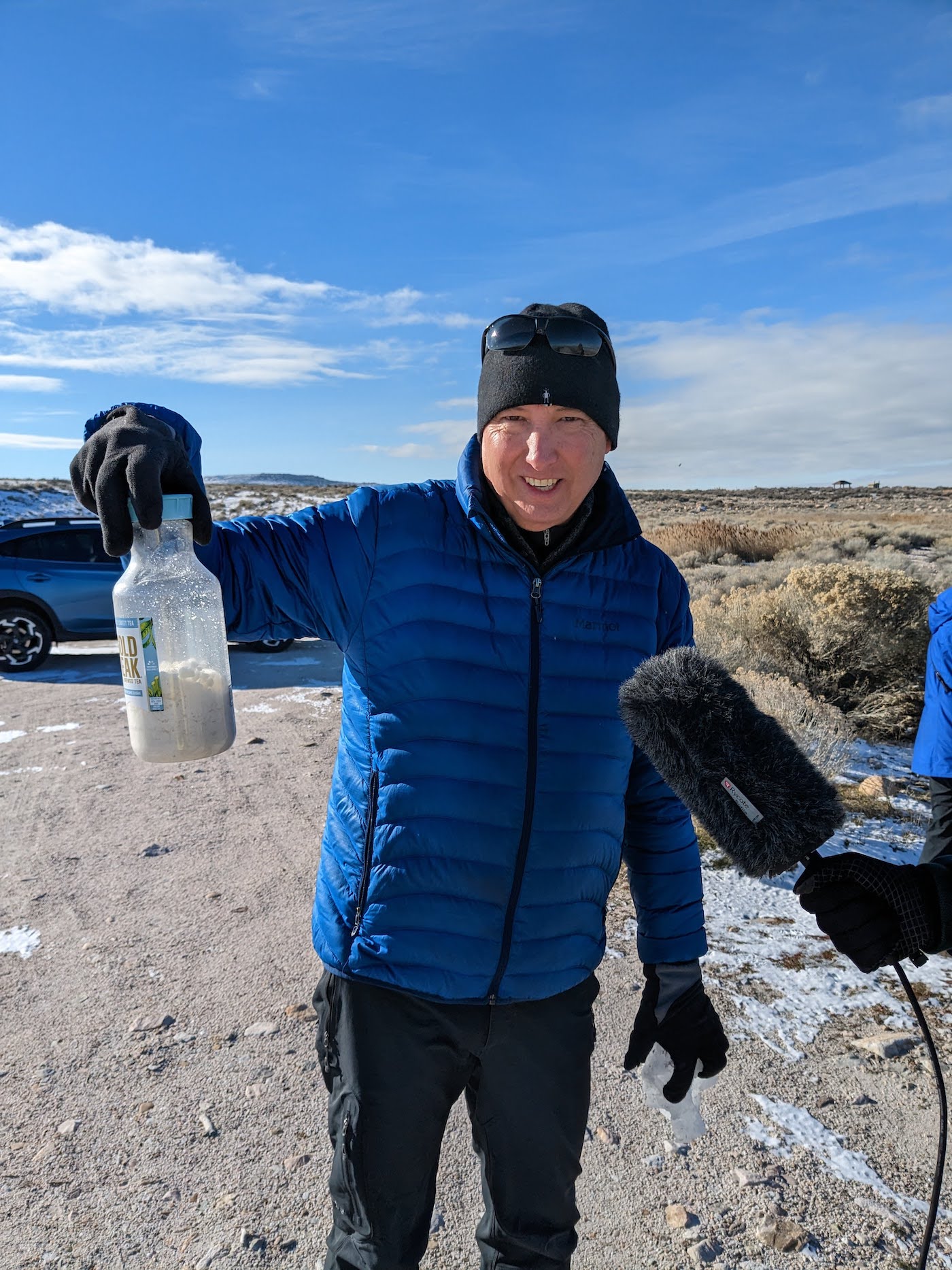kevin perry with great salt lake salt, filling a bottle almost halfway.