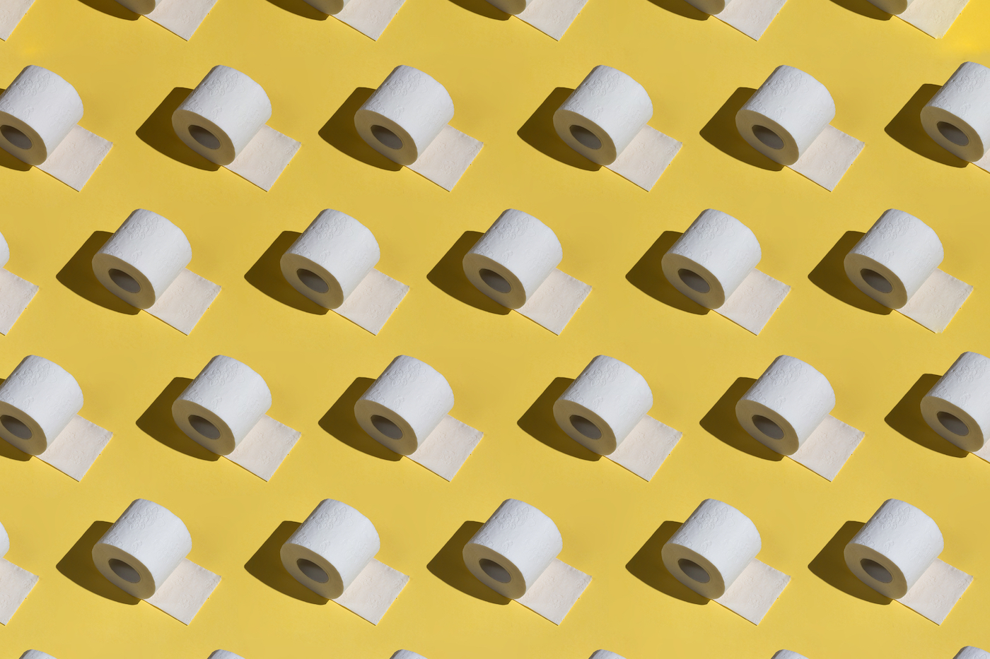3d pattern of toilet paper isolated on the yellow background.wallpaper for bathroom