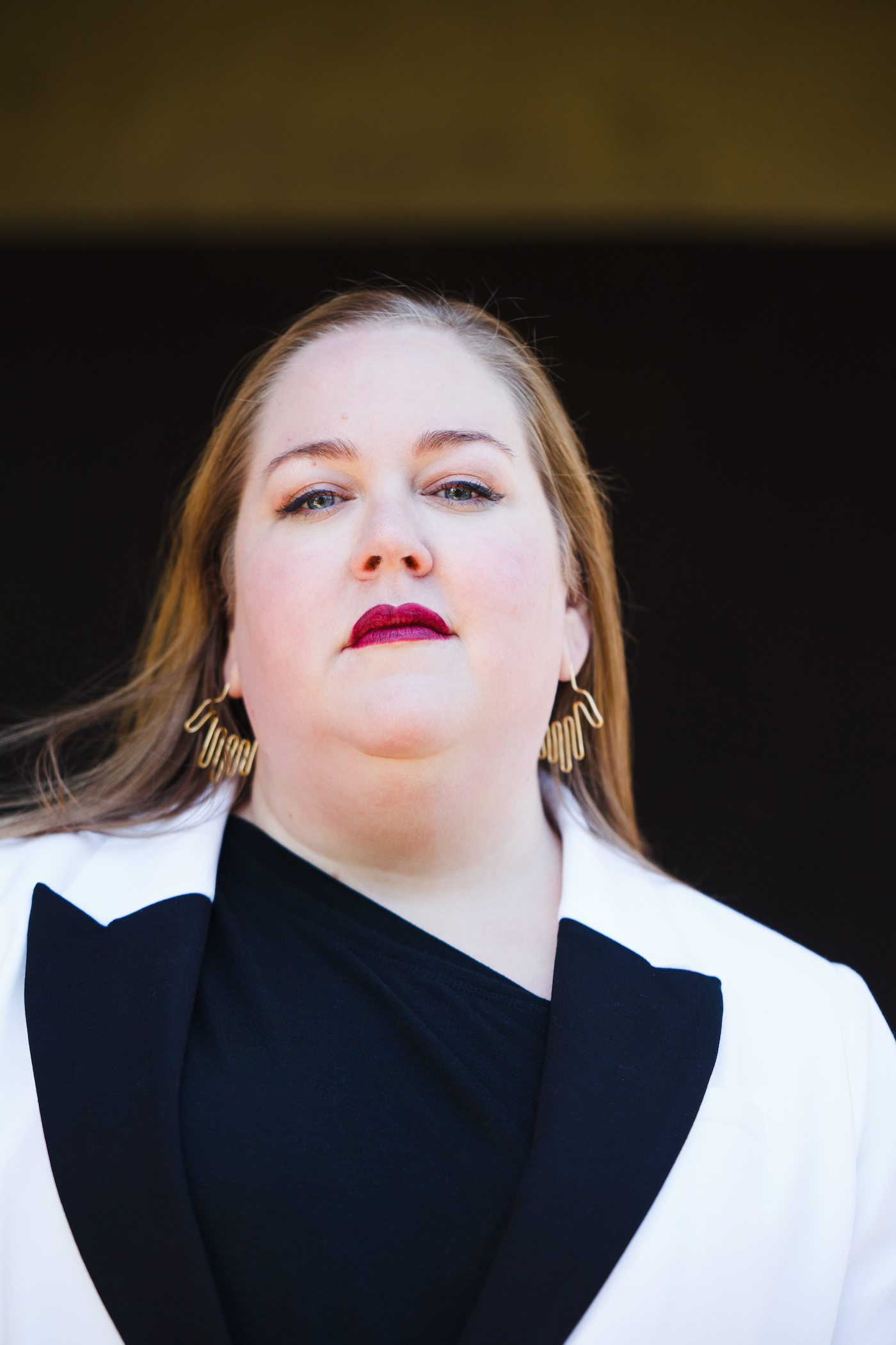 Aubrey Gordon, a fat woman, looking at the camera for a bold and confident headshot.