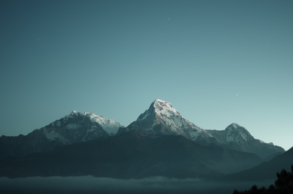 A white-capped mountain in the distance.