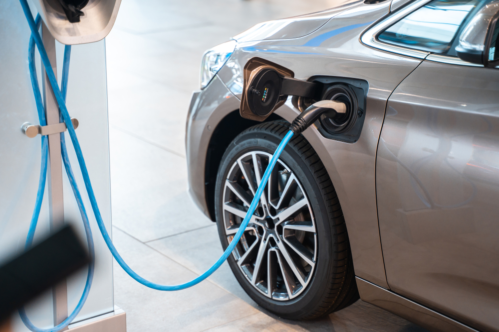 a close up of an electric car tire as it charges