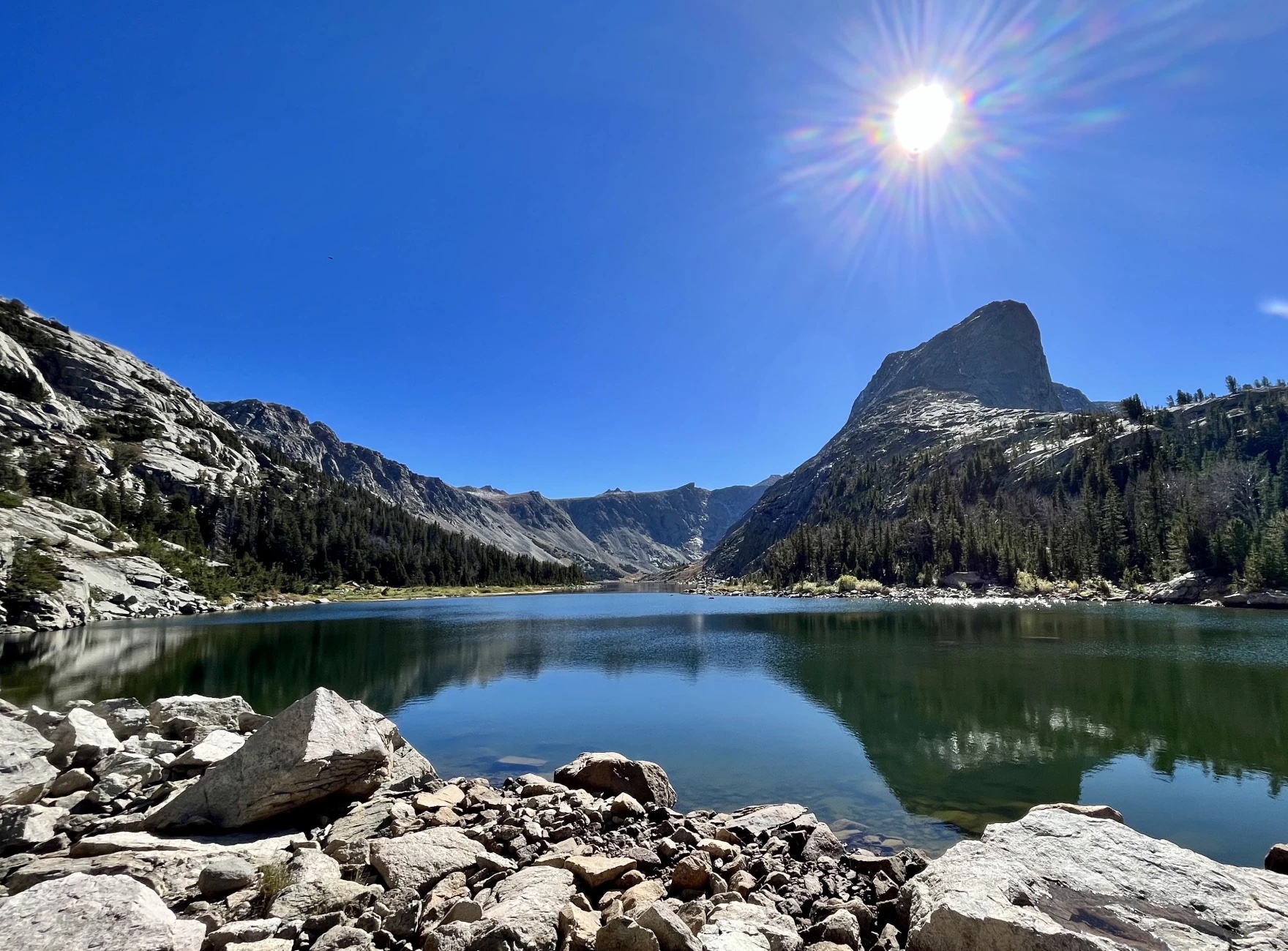 Mountains surrounding a lake.