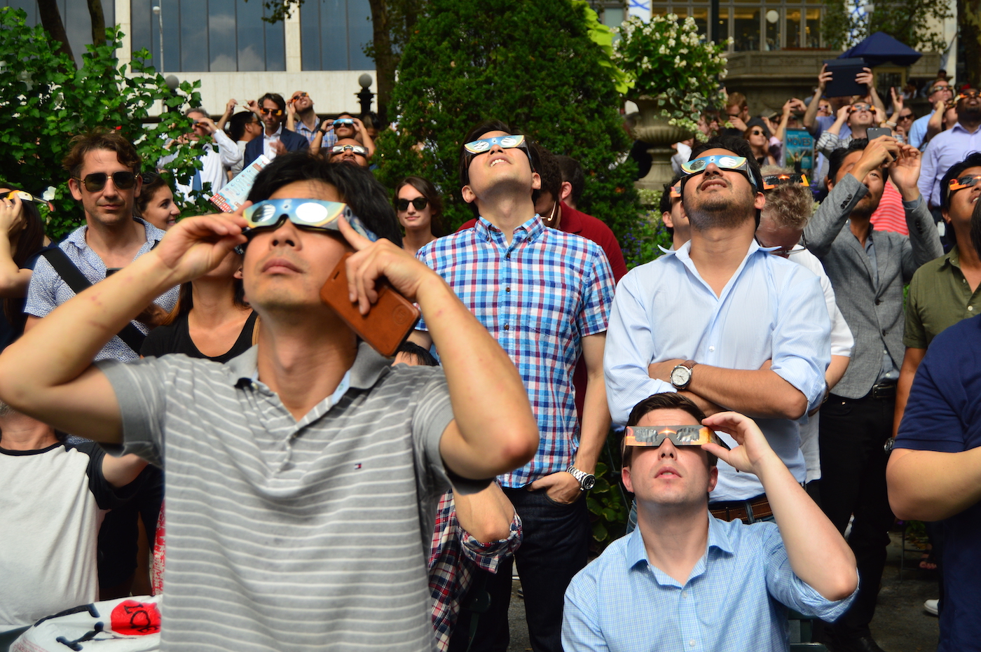 New York, NY, USA August 21 New Yorkers don their solar glasses to view the solar eclipse in Bryant Park in Manhattan