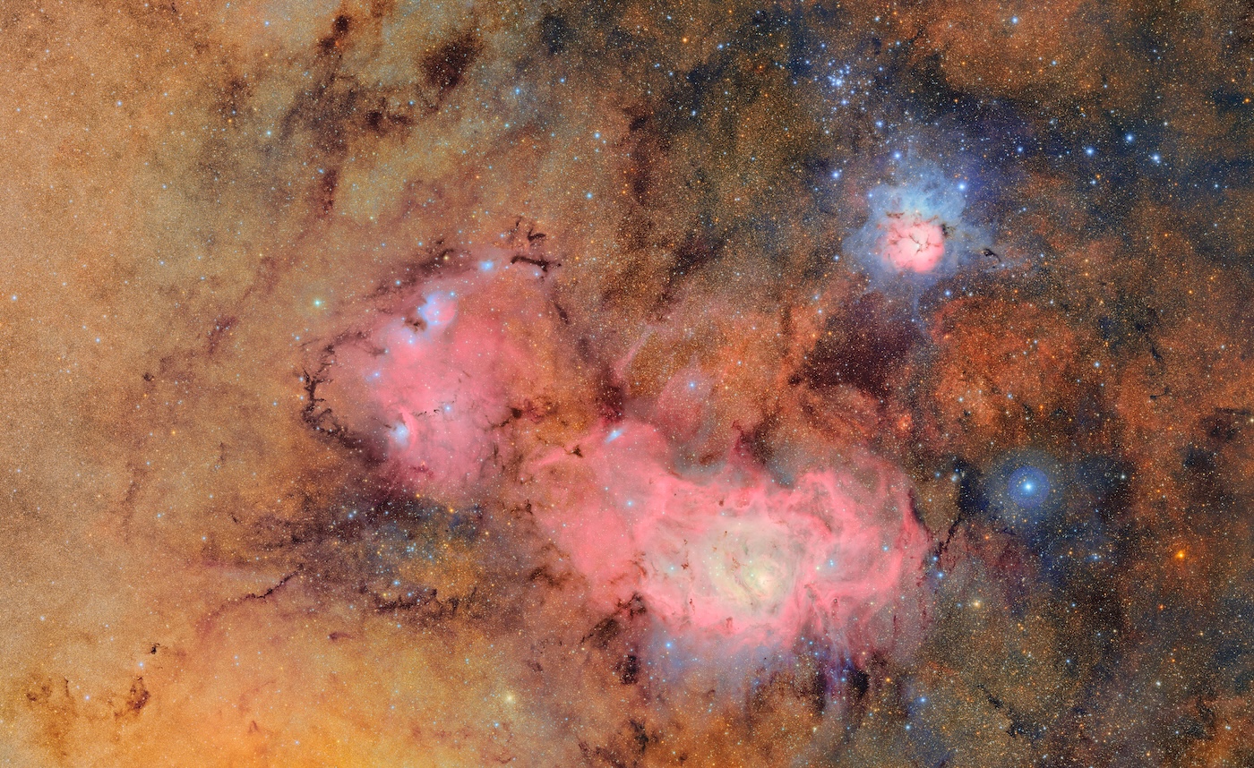 A beautiful view of two nebulas swirling in space