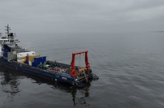 A boat sitting in still water