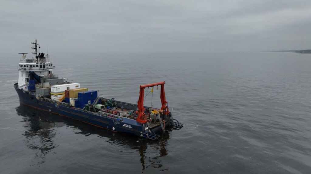 A boat sitting in still water