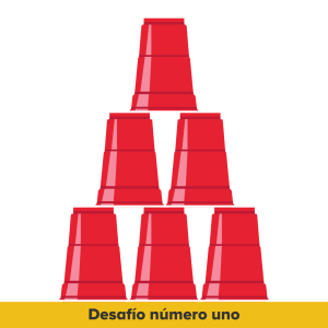 Una ilustración muestra seis vasos de plástico rojos en una configuración piramidal con tres en la fila inferior, dos en la fila central y uno en la parte superior. El texto dice el Desafío Número Uno.