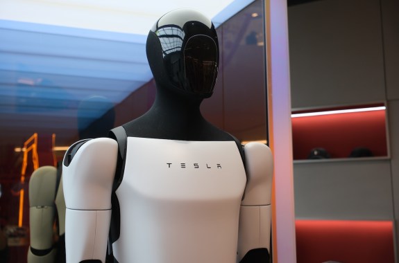 Shanghai,China-Feb.15th 2025: Tesla robot (Tesla bot) Optimus with brand logo. Humanoid robots