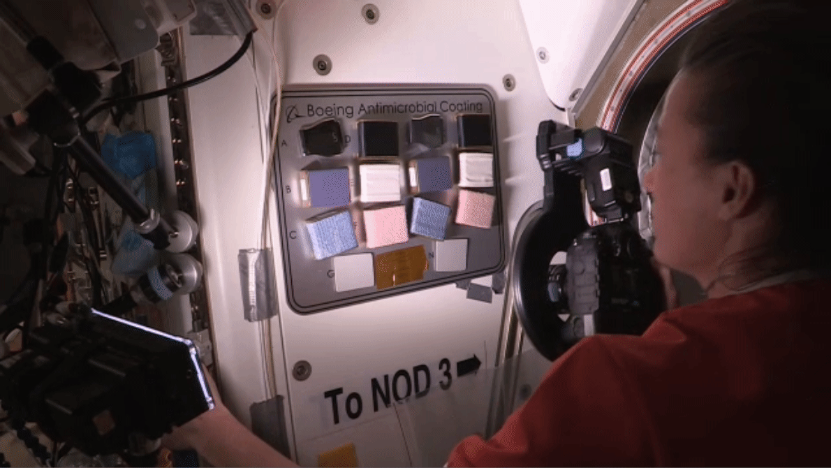 NASA astronaut Dr. Megan McArthur documents touch panels installed for the ISS Boeing Antimicrobial Coating investigation. 